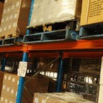 Boxes of products stored in a warehouse on racks